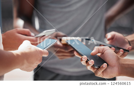 Smartphone in hand, friends group and internet sharing or social media content creation together. Young men hands, digital social networking and gen z students mobile online teamwork collaboration 124560615