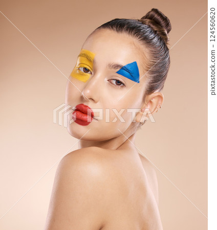Beauty, makeup and clown by woman in studio for fun, art and creative expression against a brown background with mockup. Face, portrait and pigment cosmetic product with girl model circus aesthetic Beauty, makeup and clown by woman in studio for fun, art and creative expression against a brown background with mockup. Face, portrait and pigment cosmetic product with girl model circus aesthetic 124560620