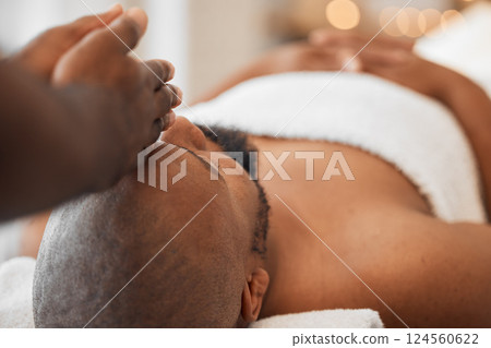 Spa, African man and masseuse hands for head massage, mental health and body wellbeing. Calm, relax and luxury beauty skincare wellness, physical therapy treatment or peaceful facial skin detox 124560622
