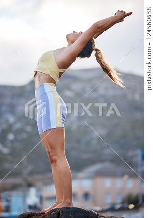 Woman, fitness and yoga in pose or stretching for healthy wellness, exercise or workout in the outdoors. Female in spiritual training, zen or stretch for mind, body and awareness for mental wellbeing Woman, fitness and yoga in pose or stretching for healthy wellness, exercise or workout in the outdoors. Female in spiritual training, zen or stretch for mind, body and awareness for mental wellbeing 124560638