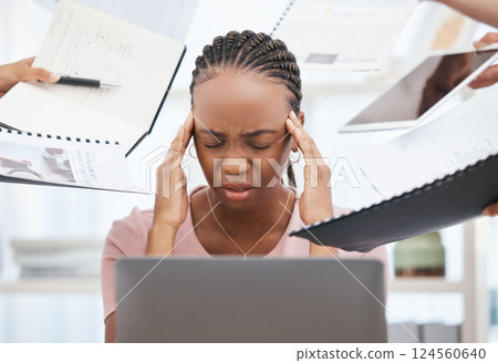 Stress, burnout and overworked employee with documents give her headache from chaos, confusion and corporate overload. Black woman at work, overwhelmed office employee and managing anxiety and panic 124560640