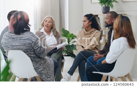 Counseling, group and psychology discussion with group of diversity people in therapy for depression, stress and anxiety. Men and women healing during psychologist meeting talking about mental health Counseling, group and psychology discussion with group of diversity people in therapy for depression, stress and anxiety. Men and women healing during psychologist meeting talking about mental health 124560643