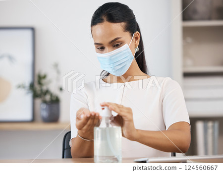 Bacteria, covid and woman cleaning hands for medical and healthcare compliance in an office at work. Mexico, coronavirus and worker in face mask washing fingers with hand sanitizer to stop spread 124560667