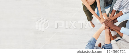 Hands together, teamwork and office diversity to show support and community with mockup. Above view of collaboration, team and workplace goal of corporate business staff with motivation and mock up 124560721