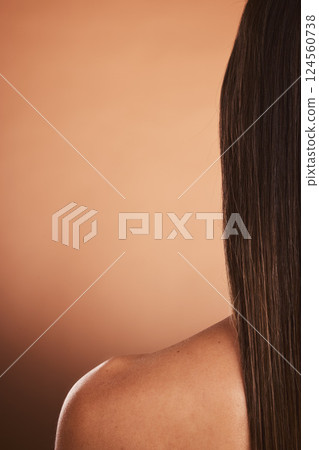 Beauty, hair care and skincare with back of woman isolated on brown studio background. Wellness, health and rear view of female model with long, healthy and beautiful, gorgeous hair or hair treatment Beauty, hair care and skincare with back of woman isolated on brown studio background. Wellness, health and rear view of female model with long, healthy and beautiful, gorgeous hair or hair treatment 124560738