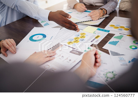 Hands, finance and business people in a meeting with chart, graph and documents in office. Hand, paper and digital marketing statistics with team collaboration on sales, growth and profit analysis 124560777