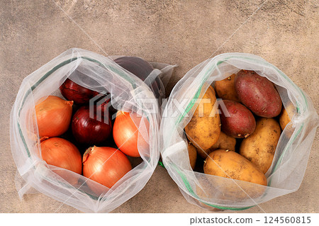 Healthy natural products in eco bag to boost immunity, healthy lifestyle concept, zero waste. Dietary vegetables in fabric packaging. Banner for the store. No plastic. Selective focus 124560815
