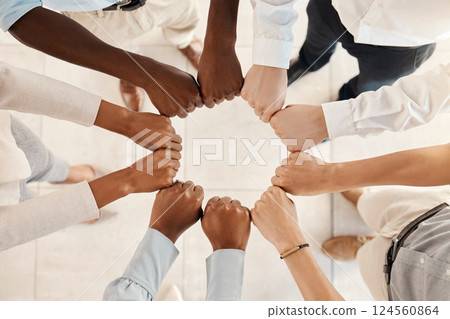 Diversity, solidarity and hands of business people in circle for teamwork, collaboration and synergy for team building in a corporate office. Men and women group together for support, trust and power 124560864