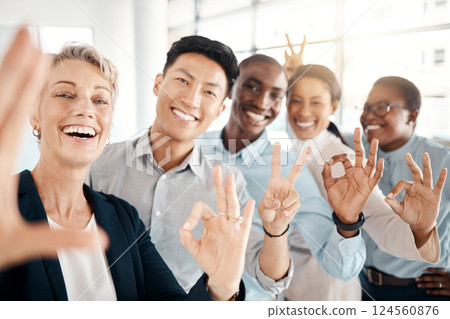 Hand sign, selfie and happy employee group showing diversity, company support and community. Portrait of business people with hands gesture ready for global teamwork collaboration with a smile Hand sign, selfie and happy employee group showing diversity, company support and community. Portrait of business people with hands gesture ready for global teamwork collaboration with a smile 124560876