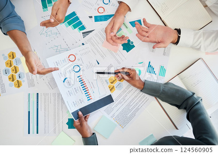 Digital marketing, hands and data analysis meeting for financial reports and branding for a startup company. Paperwork, charts and business people planning a global seo promotional campaign project 124560905