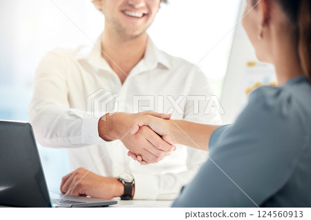 Handshake, meeting and business people in an interview, partnership and welcome at a corporate company. Thank you, b2b and workers shaking hands with a smile for a contract, deal and recruitment Handshake, meeting and business people in an interview, partnership and welcome at a corporate company. Thank you, b2b and workers shaking hands with a smile for a contract, deal and recruitment 124560913