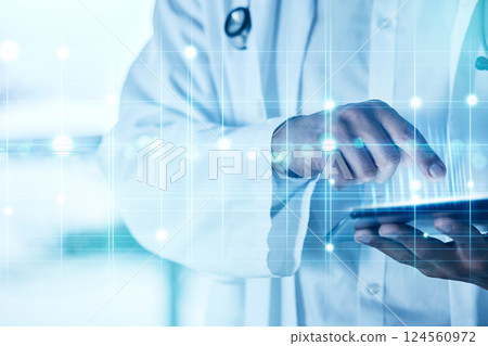 Hands, healthcare and future with a doctor using a tablet in a hospital with digital overlay or CGI. Data, ai and medical with a health professional doing research on technology for innovation 124560972