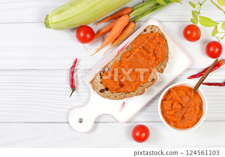 Sandwich with cereal bread and pumpkin caviar on wooden background, healthy breakfast with ingredients, healthy eating concept, space for text, selective focus 124561103