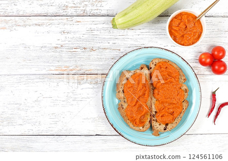 Sandwich with cereal bread and pumpkin caviar on wooden background, healthy breakfast with ingredients, healthy eating concept, space for text, selective focus Sandwich with cereal bread and pumpkin caviar on wooden background, healthy breakfast with ingredients, healthy eating concept, space for text, selective focus 124561106