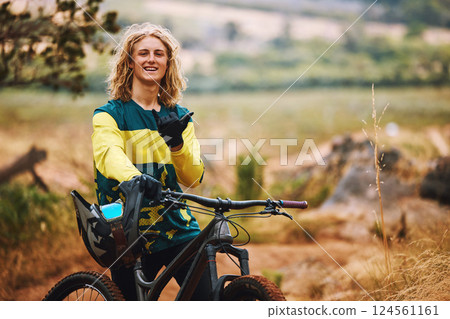 Sports, bike and cyclist man hand sign in nature on a park trail with a smile. Portrait of an adventure athlete on a bicycle ready for cycling, sport and fitness in a mountain park road in nature 124561161