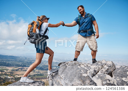 Help, couple or friends hiking on mountain in nature with a smile or training. Travel, adventure and trekking workout man and woman on an outdoor, countryside or rock climbing, exercise and support Help, couple or friends hiking on mountain in nature with a smile or training. Travel, adventure and trekking workout man and woman on an outdoor, countryside or rock climbing, exercise and support 124561386