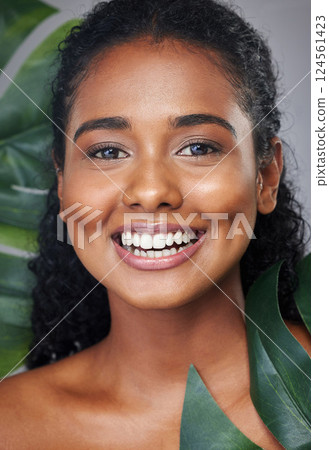 Natural skincare, leaf and portrait of black woman with healthy glowing skin, beauty cosmetics and facial makeup. Dermatology, wellness and aesthetic face of happy model girl with self care routine 124561423
