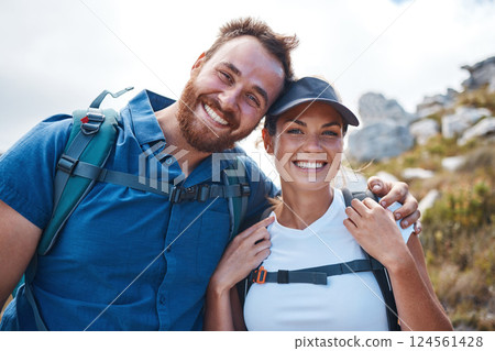 Hiking, couple and adventure outdoor, healthy and enjoy nature with smile, happy and bonding together. Hike, man and woman being active, workout and on mountain range for wellness, fitness and fun. 124561428