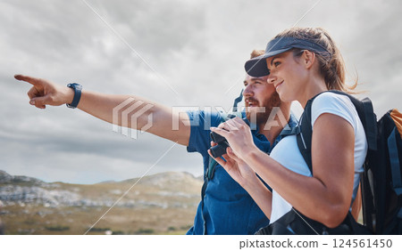 Pointing, travel and couple hiking on the mountains in a natural environment for an outdoors adventure in Canada. Freedom, lifestyle and healthy woman loves walking or trekking with partner in nature Pointing, travel and couple hiking on the mountains in a natural environment for an outdoors adventure in Canada. Freedom, lifestyle and healthy woman loves walking or trekking with partner in nature 124561450