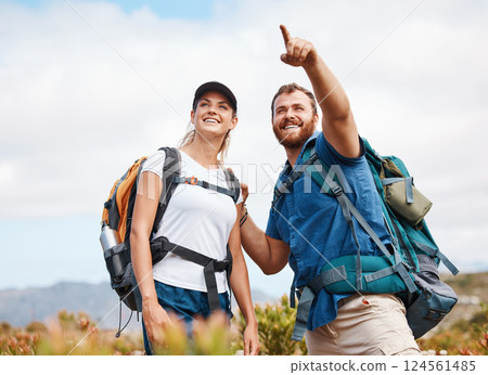 Hiking, happy and couple in nature, relax and smile, hand and pointing while talking and looking around. Friends, hikers and woman with man in forest, exercise, cardio and adventure outdoor together 124561485
