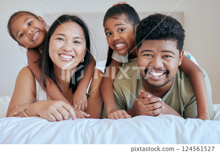 Happy family, bed and girl with mother, father and sister in a bedroom for fun, bond and rest together. Face, portrait and mexican family hug, smile and happy with kids and parents embrace in Mexico Happy family, bed and girl with mother, father and sister in a bedroom for fun, bond and rest together. Face, portrait and mexican family hug, smile and happy with kids and parents embrace in Mexico 124561527