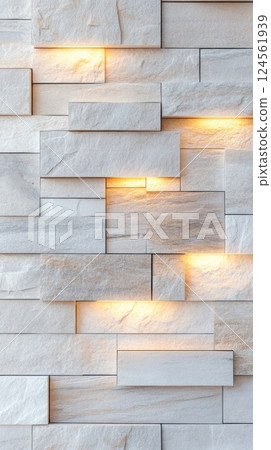 Brick wall design with alternating glass and stone illuminated in bright daylight 124561939
