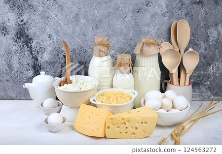 Assorted fresh dairy products, natural food concept, healthy breakfast with ingredients, maintaining healthy intestinal microflora, diet food, rustic table, selective approach 124563272