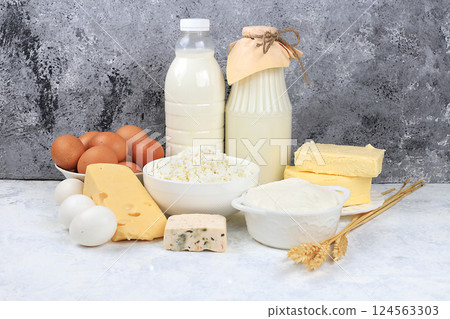 Assortment of fresh dairy products, healthy breakfast with ingredients, natural nutrition concept, maintaining healthy intestinal microflora, diet food, rustic table, selective focus 124563303