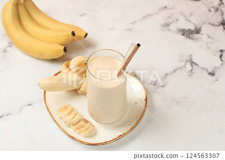 Banana vegan alternative milk lactose and gluten free, no allergies, healthy eating concept, maintaining healthy gut flora, diet food, weight loss, selective focus Banana vegan alternative milk lactose and gluten free, no allergies, healthy eating concept, maintaining healthy gut flora, diet food, weight loss, selective focus 124563307