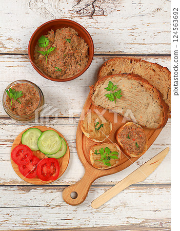 Homemade sandwiches with chicken pate, tomatoes, herbs and cucumbers, the concept of a healthy lifestyle and natural nutrition. Healthy breakfast with ingredients, advertising for a cafe, selective Homemade sandwiches with chicken pate, tomatoes, herbs and cucumbers, the concept of a healthy lifestyle and natural nutrition. Healthy breakfast with ingredients, advertising for a cafe, selective 124563692