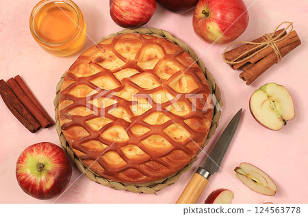 Apple pie with honey,apples, spices, modern bakery concept, advertisement for menu and recipe, banner, selective focus, top view, space for text, 124563778