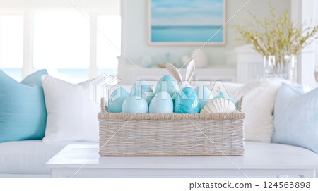 Coastal style Easter decor featuring pastel blue eggs and an Easter bunny in a beach house setting with seashells enhancing the nautical theme 124563898