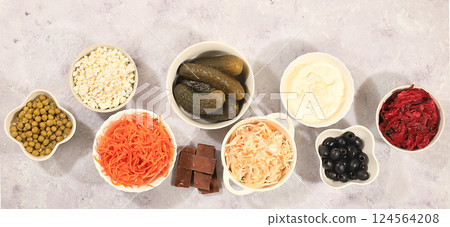 Food background with probiotics, advertising banner, healthy natural food concept, sauerkraut, kimchi, beets, olives, peas, yogurt, cream, chocolate, healthy foods for your health, top view, selective Food background with probiotics, advertising banner, healthy natural food concept, sauerkraut, kimchi, beets, olives, peas, yogurt, cream, chocolate, healthy foods for your health, top view, selective 124564208
