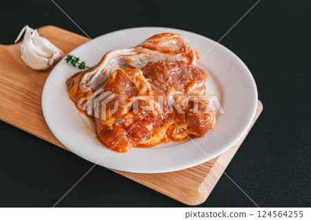 Garlic miso marinated chicken 124564255