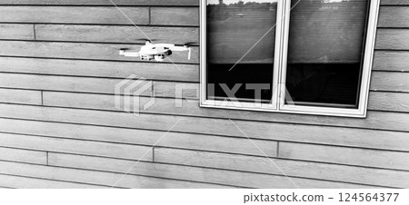 Inside a circular concrete drainage culvert with a trickle of water Inside a circular concrete drainage culvert with a trickle of water 124564377