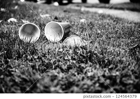 Crushed and discarded red plastic cups after a college party 124564379