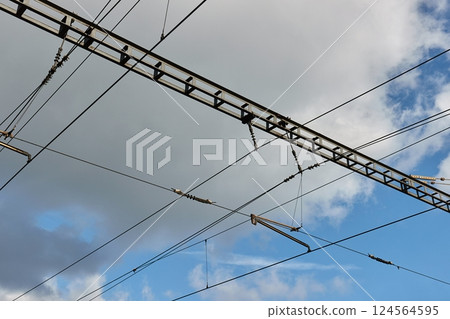 Overhead electric catenary wires of a railroad 124564595
