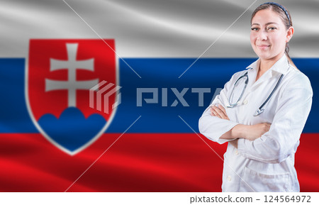 Female doctor on Slovakian flag. Doctor with crossed arms on Slovakian flag. Slovakia health and care concept 124564972
