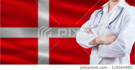Doctor With Crossed Arms On Denmark Flag. Denmark Health And Care Concept. Female Doctor On Denmark Flag Doctor With Crossed Arms On Denmark Flag. Denmark Health And Care Concept. Female Doctor On Denmark Flag 124564980