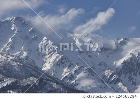Spring on Mt. Hakuba and the snow patterns of puddling horses in Hakuba Village, Nagano Prefecture 124565284