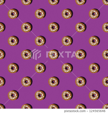 Seamless pattern with choclate donuts with Christmas tree on top on the violet background. Concept of New Year, Celebration, Cafe. Food background 124565646