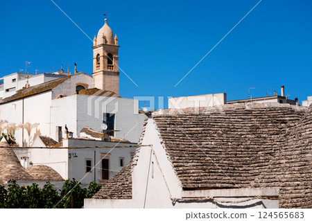 Historic buildings and stone rooftops in Alberobello Historic buildings and stone rooftops in Alberobello 124565683