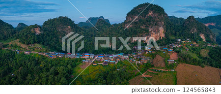 Aerial view of stunning sunrise above a small village Aerial view of stunning sunrise above a small village 124565843