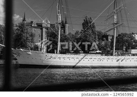 Blue midnight light over a moored sailing boat in the outer archipelago of Stockholm, Sweden 124565992