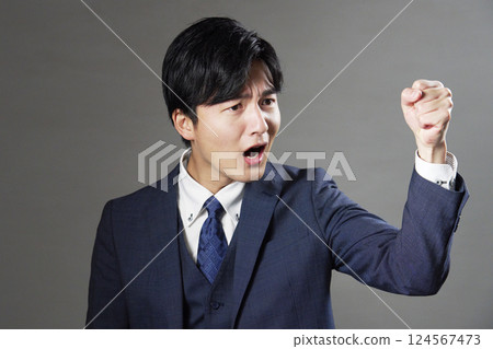 Businessman violence power harassment black background right facing 124567473