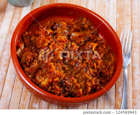 Delicious dish of stewed cabbage with pearl barley 124569943