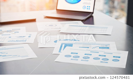 Documents and laptop in an urban office building 124570481