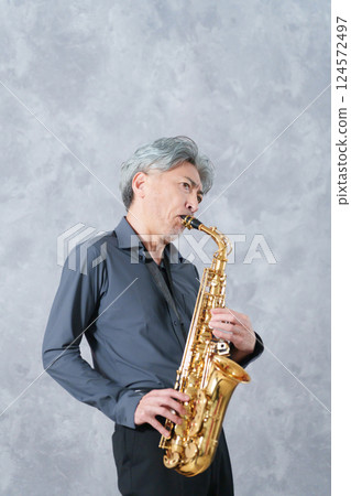 Male saxophone player Male saxophone player 124572497