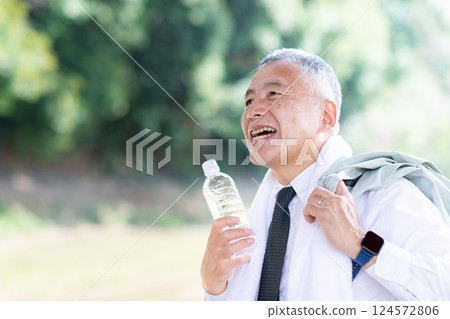 A man going out in the heat 124572806