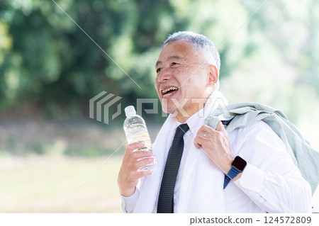 A man going out in the heat 124572809